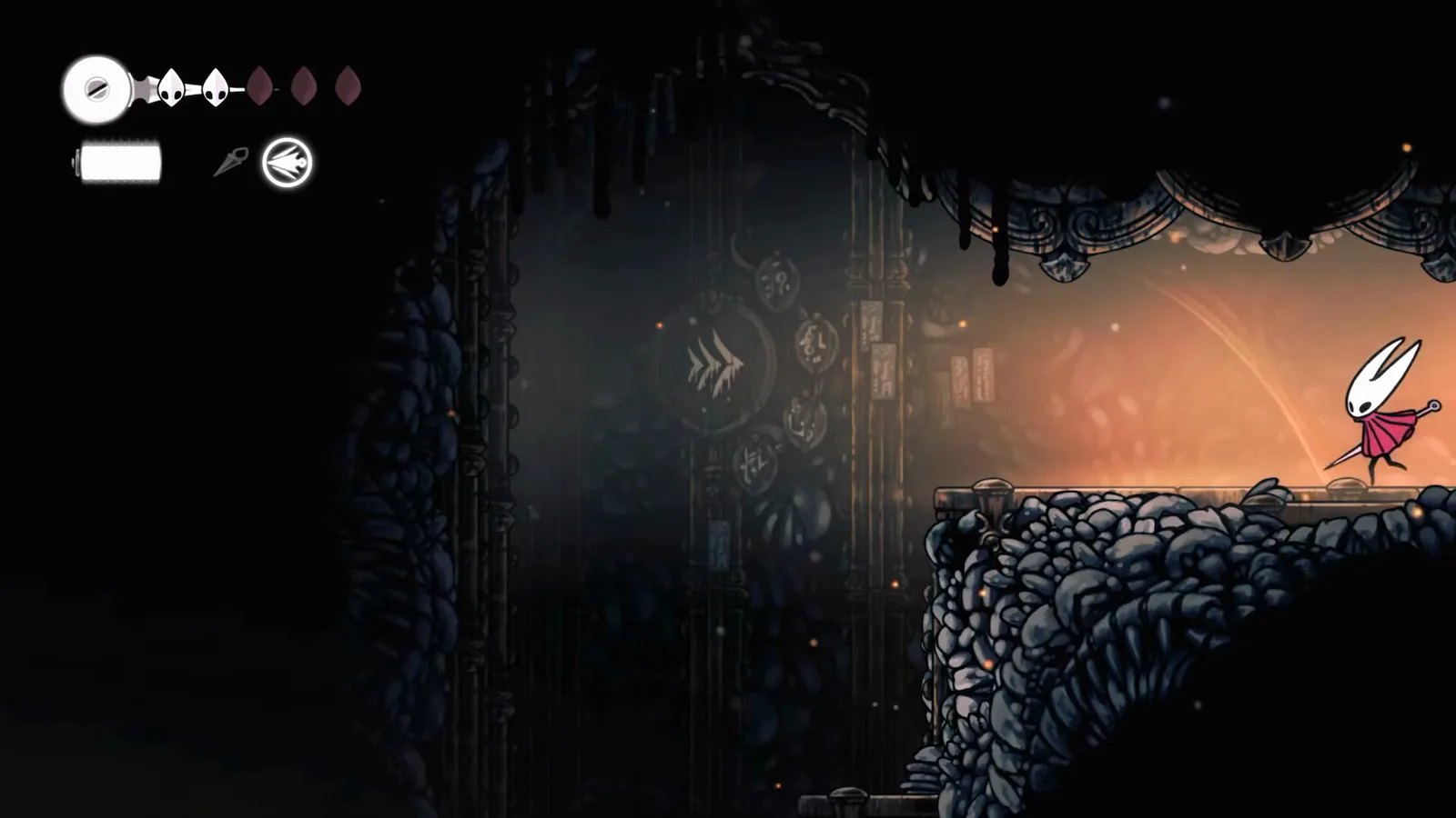 Bellway fast-travel station icon glowing on a pillar in the Deep Docks in Hollow Knight: Silksong, the transport point you use to return to Bone Bottom