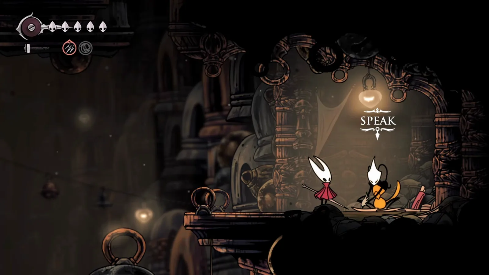 Close-up of Hornet speaking with Shakra in Bellhart in Hollow Knight: Silksong, the mid-game spot to buy any map you missed